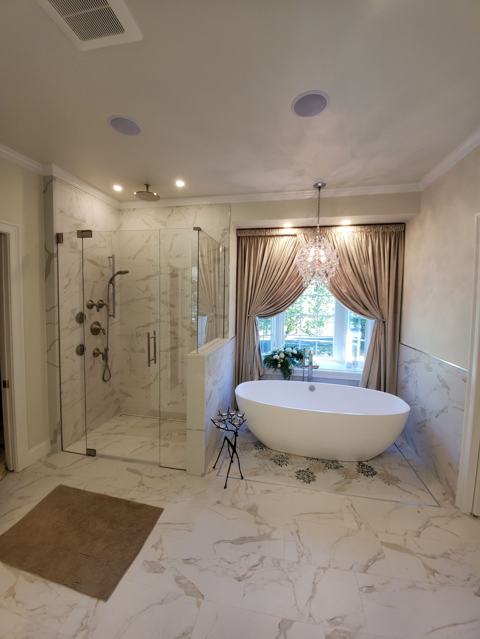 Primary bath with custom vanity by T/R Millwork